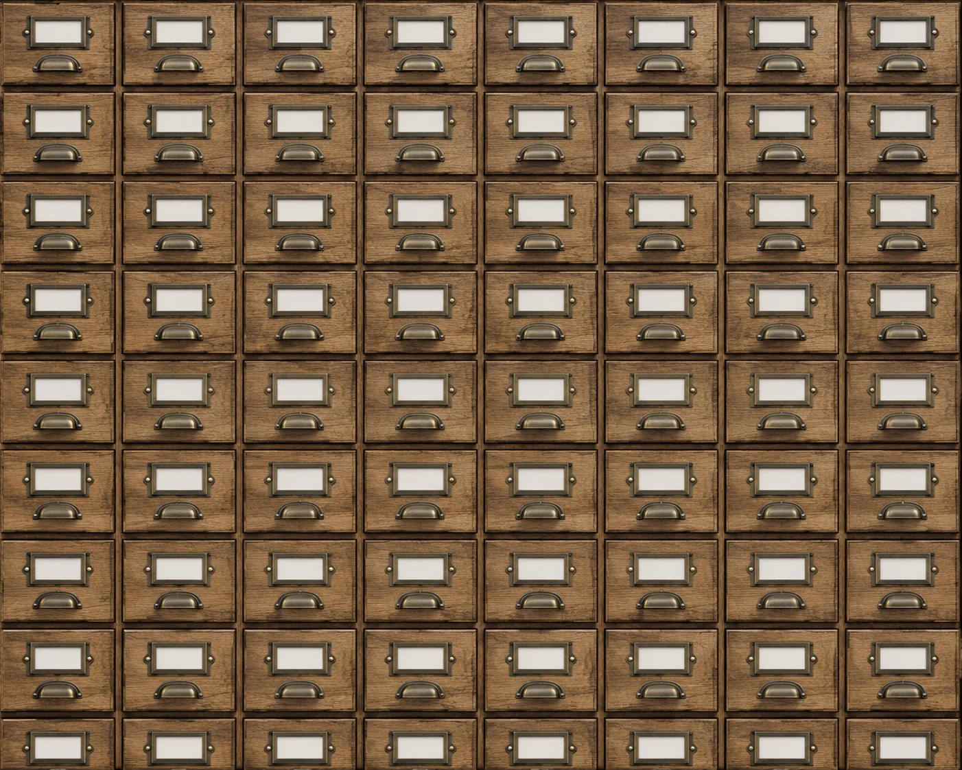 A wall of small labelled index drawers in a reference room